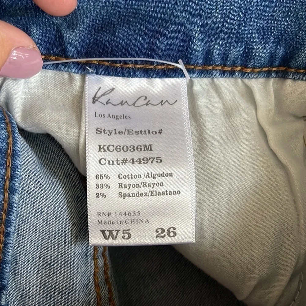 Kancan mid rise medium wash distressed five pocket size 5 size 26 jean shorts
